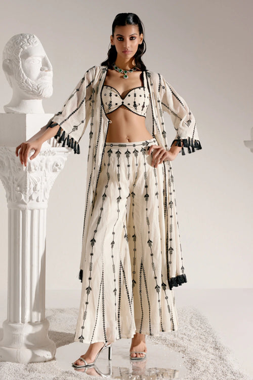 Black And White Criss Cross Bustier With Flared Pants and Jacket