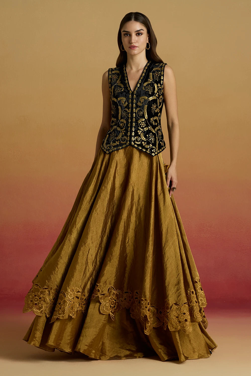 Black and Gold Embellished Waistcoat with Layered Amaryllis Lehenga