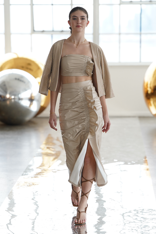 CrÃƒÂ¨me Faux Leather Jacket and Ruffle Skirt with Bustier