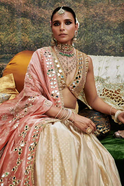 Svet Gulal Lehenga Set