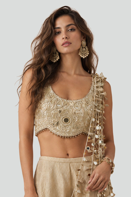 Off-White Organza Choli And Gold Sharara With Attached Dori Tassels