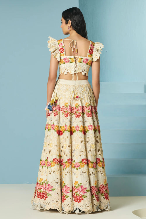 Ivory Cutwork And Beadwork Bustier With Lehenga