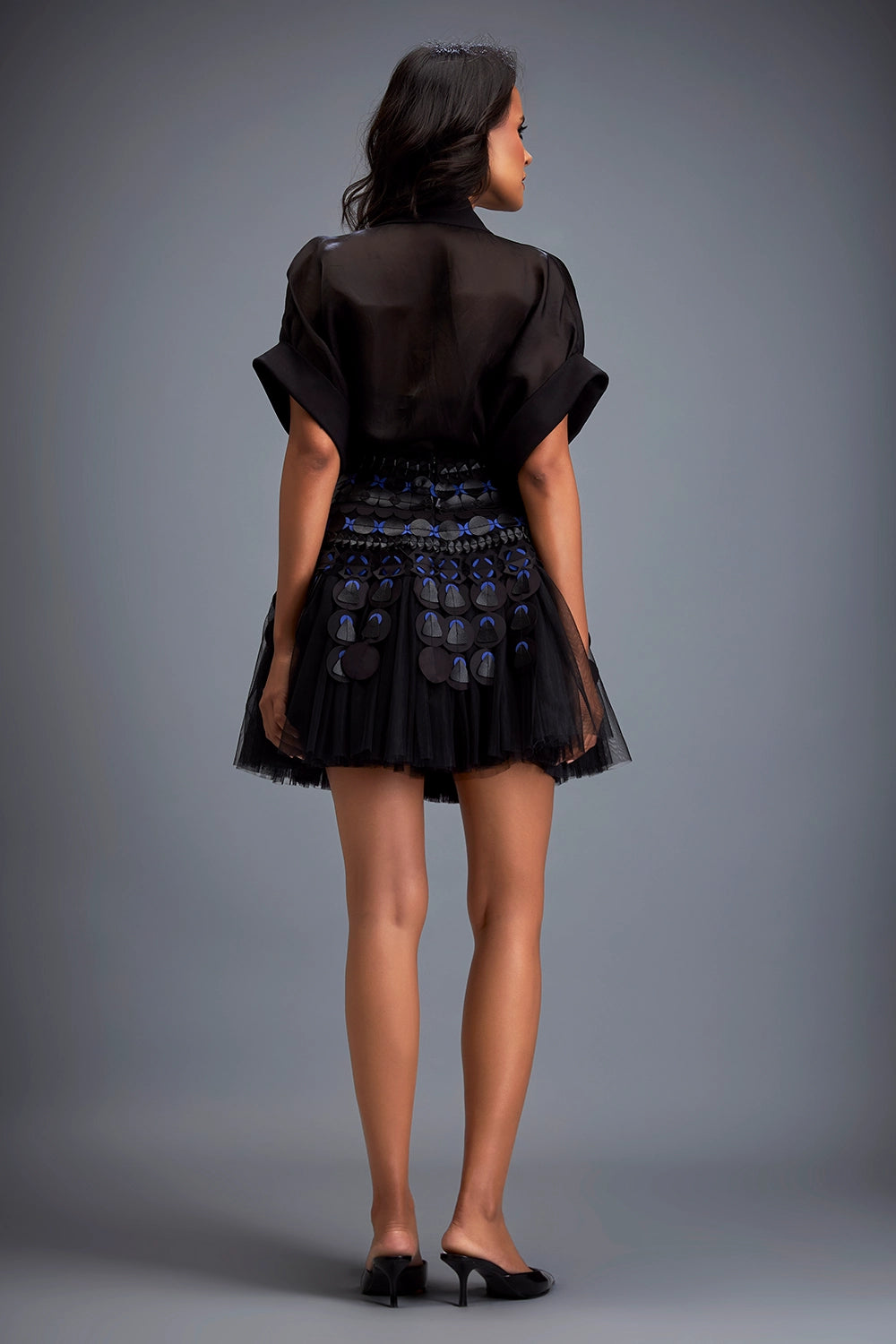 Black Top With High-Waisted Mini Skirt