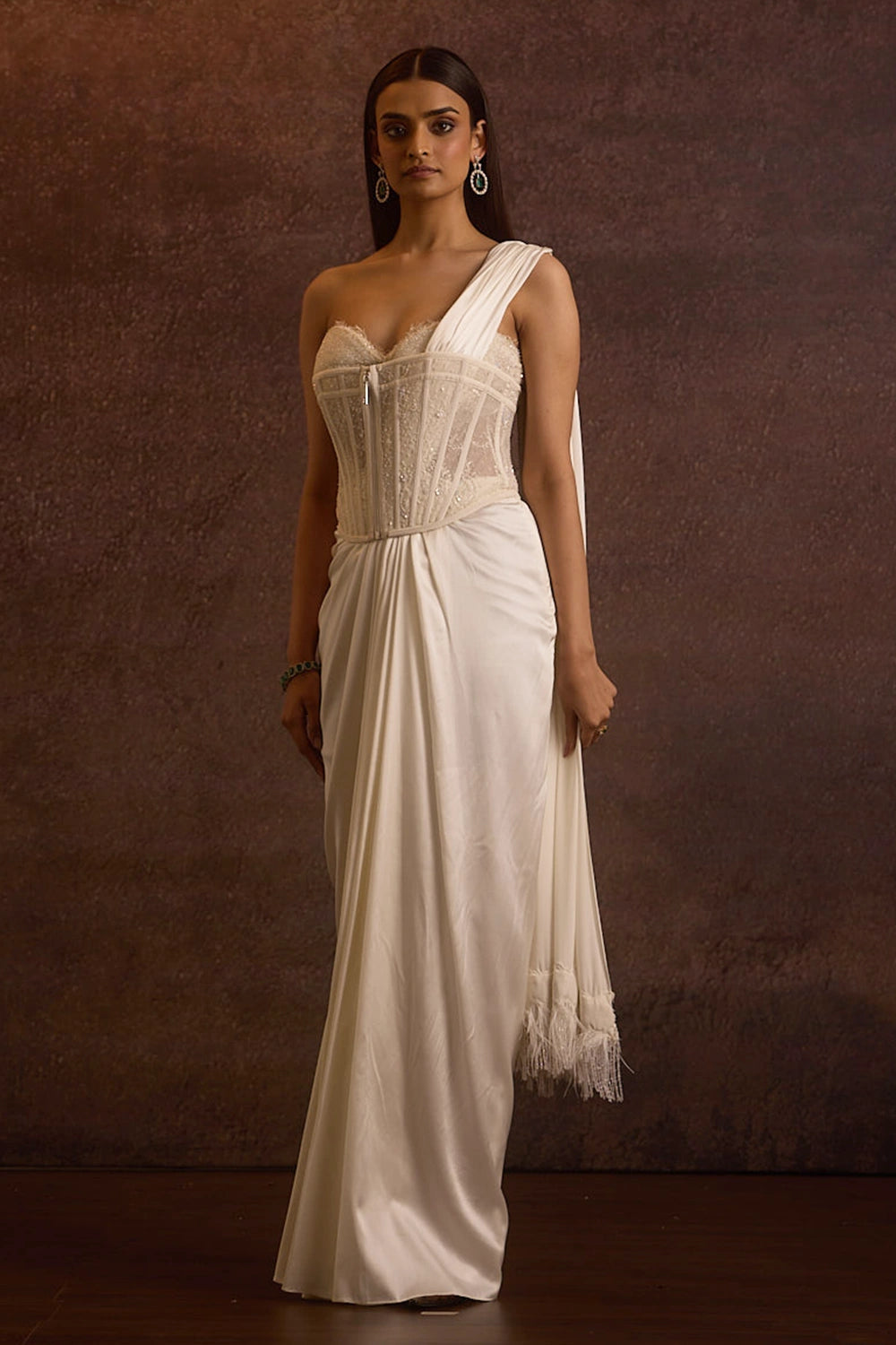 Sohvi Ivory Bustier Blouse With Corset Belt And Drape Slit Saree