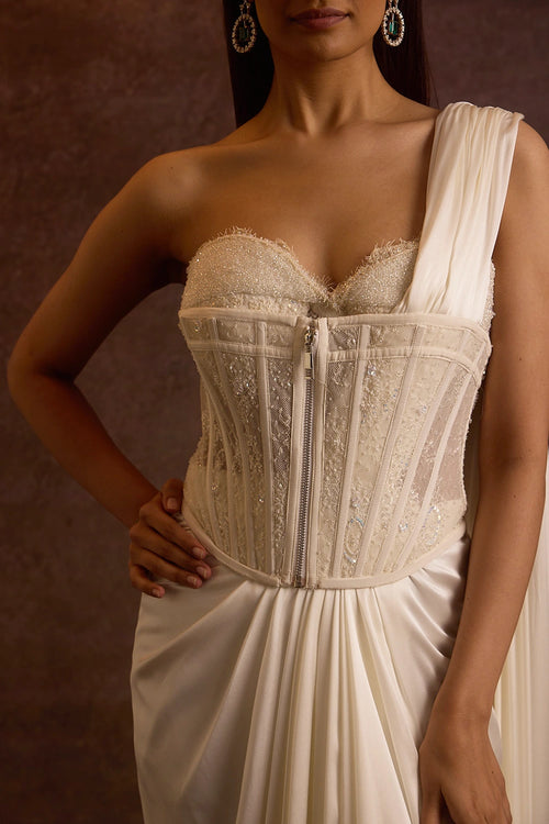 Sohvi Ivory Bustier Blouse With Corset Belt And Drape Slit Saree