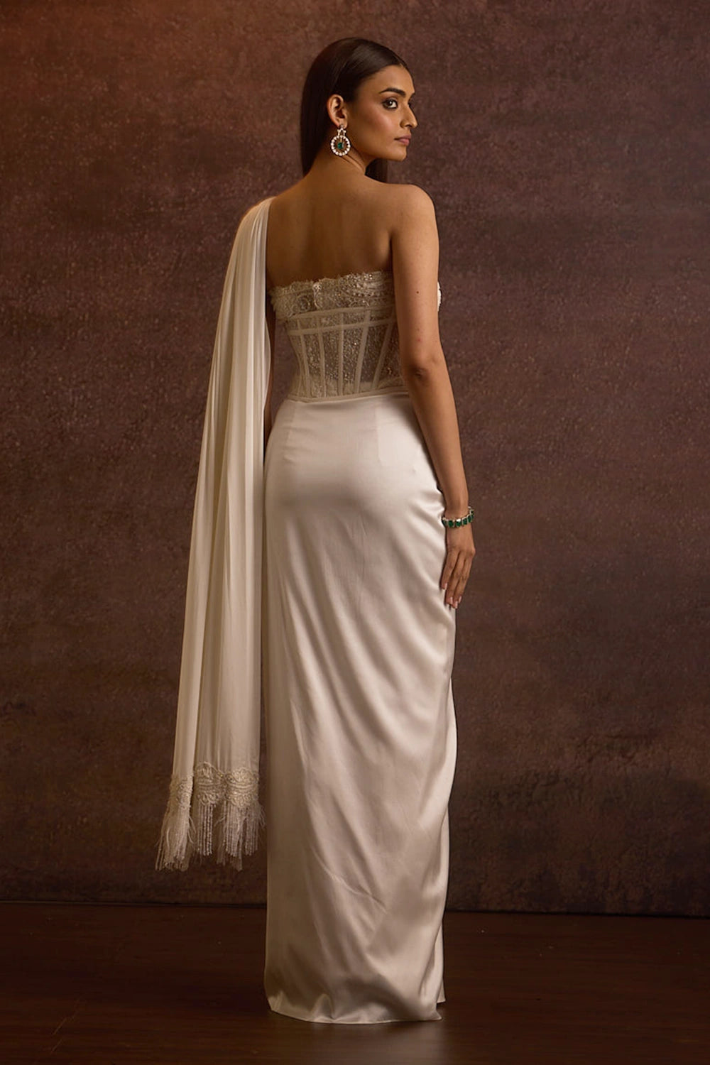 Sohvi Ivory Bustier Blouse With Corset Belt And Drape Slit Saree
