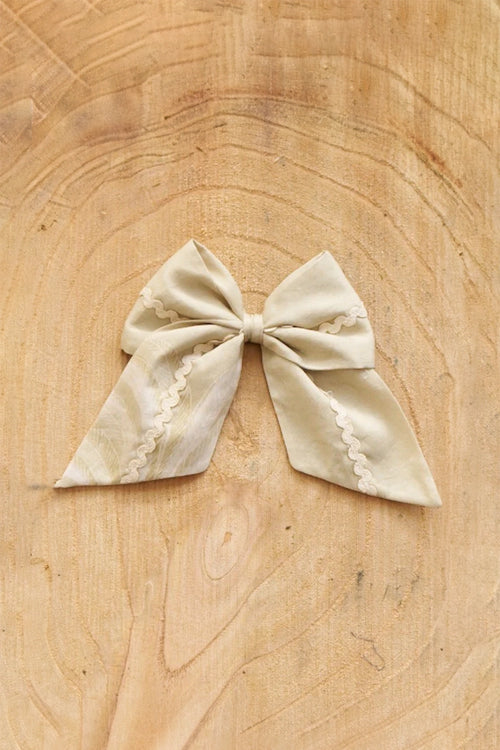 Palm Royale Bow