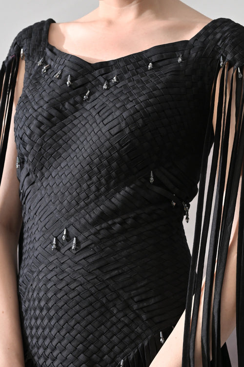 Black Gown With Silhouette Defined By Texture And Movement