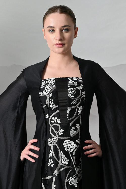 Black Gown With Winged Draped Panels
