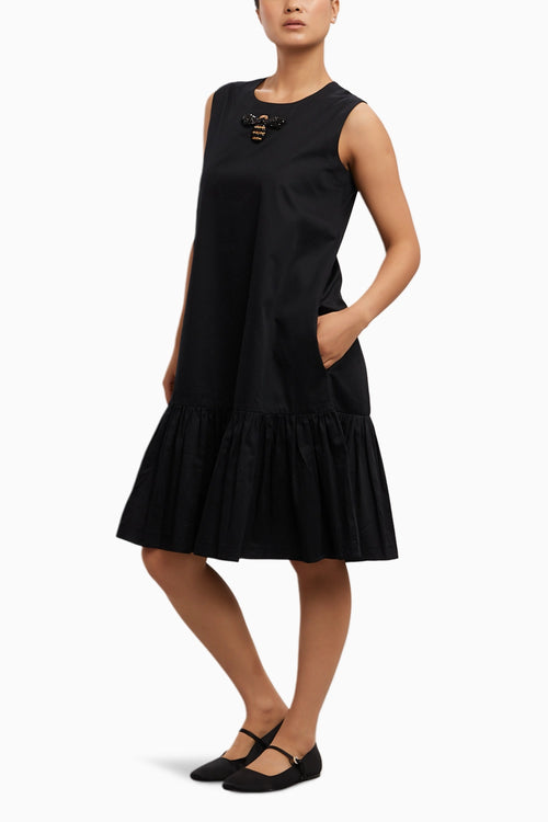 Black Shortbfrill Dress with Beetle Brooch