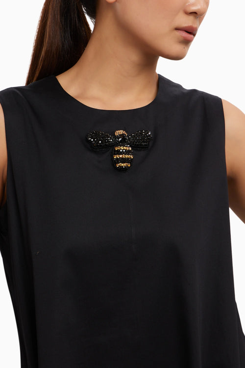 Black Shortbfrill Dress with Beetle Brooch