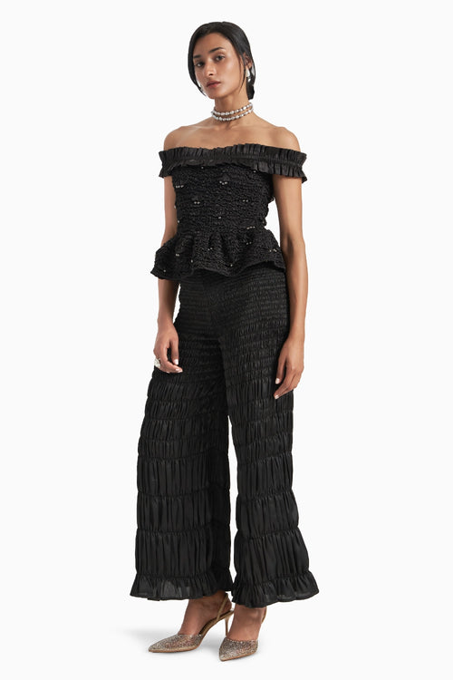 Black Off-Shoulder Peplum Top With Scalae Smocked Wide Leg Pants