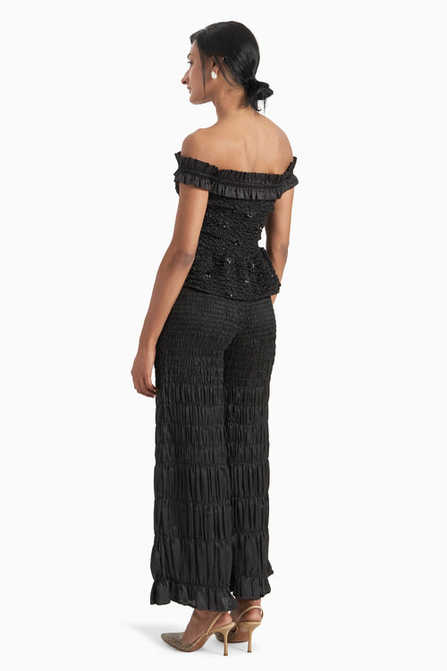Black Off-Shoulder Peplum Top With Scalae Smocked Wide Leg Pants