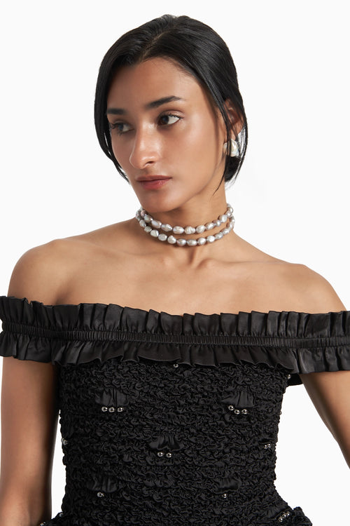 Black Off-Shoulder Peplum Top With Scalae Smocked Wide Leg Pants