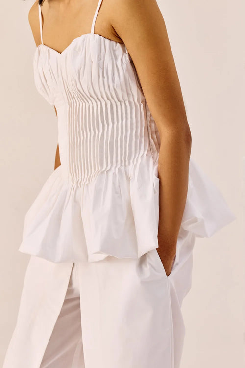 White Peplum Bustier And Pants Set