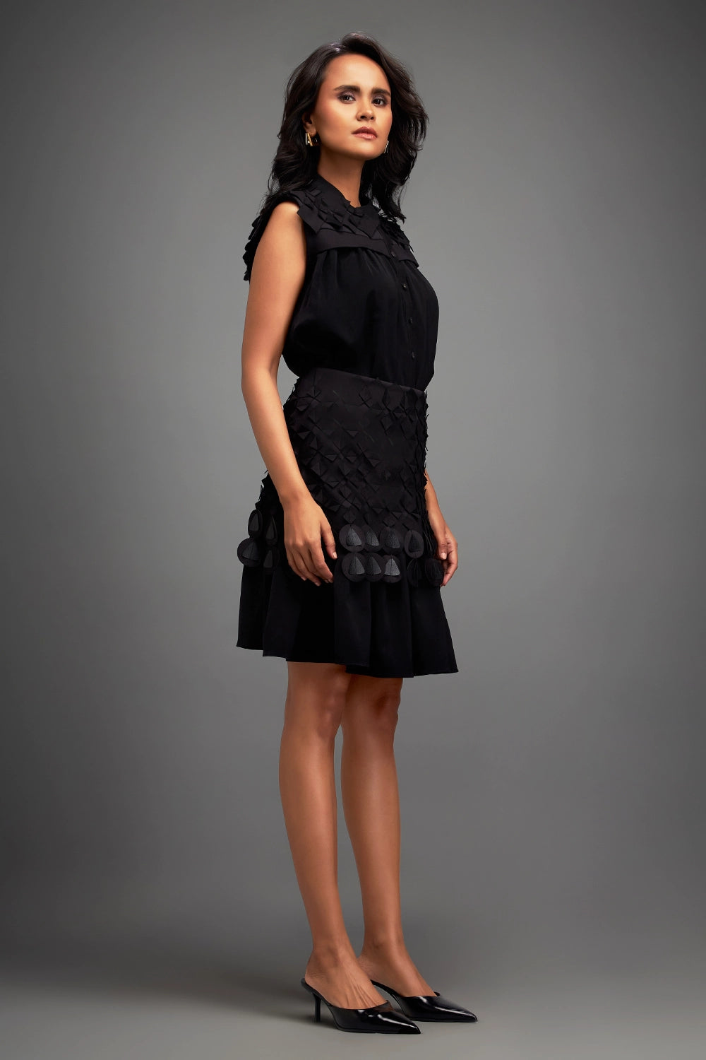 Black Sleeveless Buttoned Top with Applique Skirt