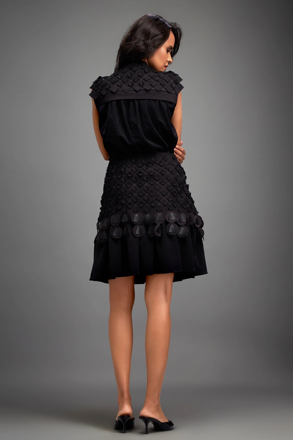 Black Sleeveless Buttoned Top with Applique Skirt