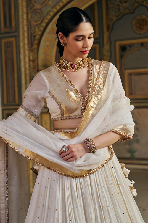 Ivory Double Border Golden Zari Mukesh Lehenga