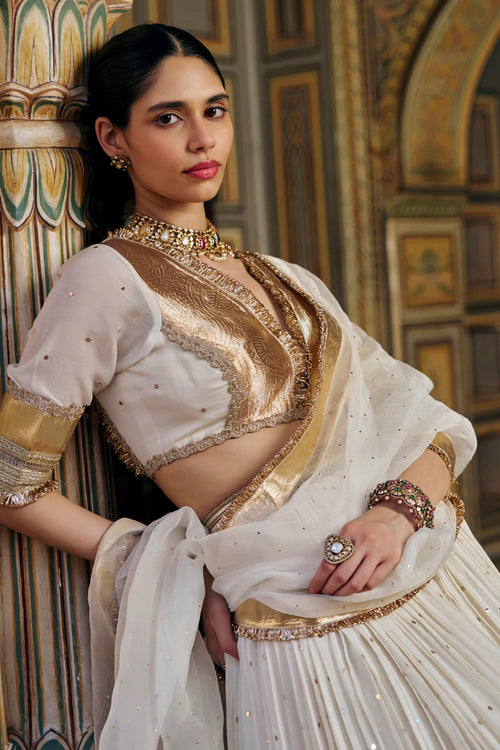 Ivory Double Border Golden Zari Mukesh Lehenga