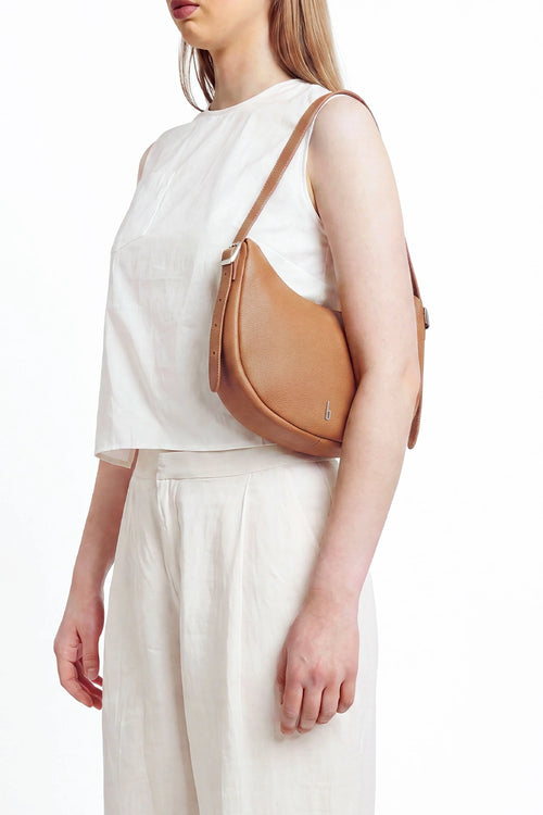 Ina Pebble Tan Crescent Crossbody Bag