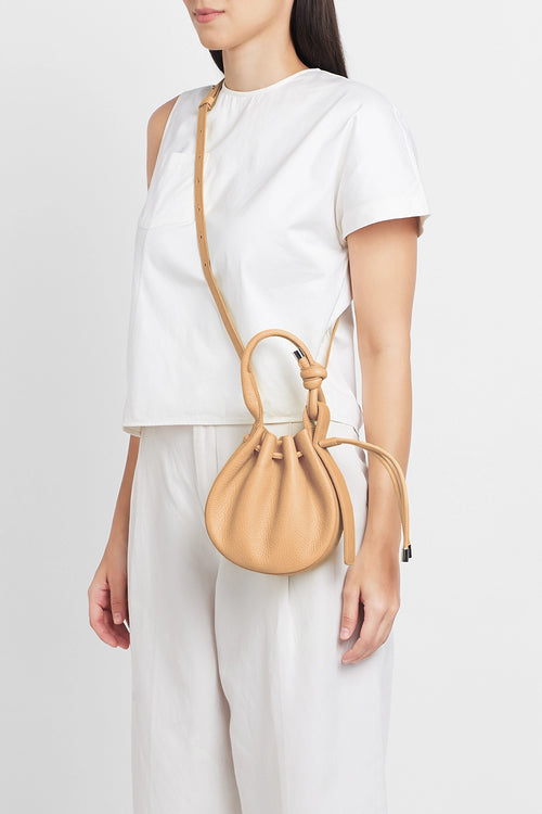 Ina Pebble Peach Mini Crossbody Bag