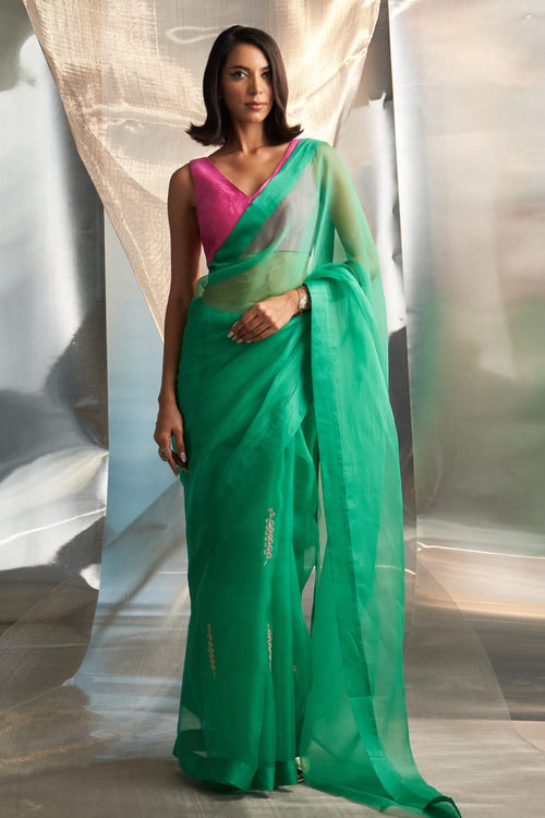Lush Green Saree With Bloom Pink Blouse