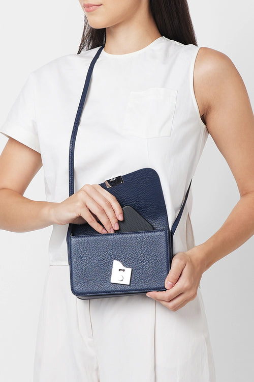 Simone Pebble Navy Mini Curve Crossbody Bag