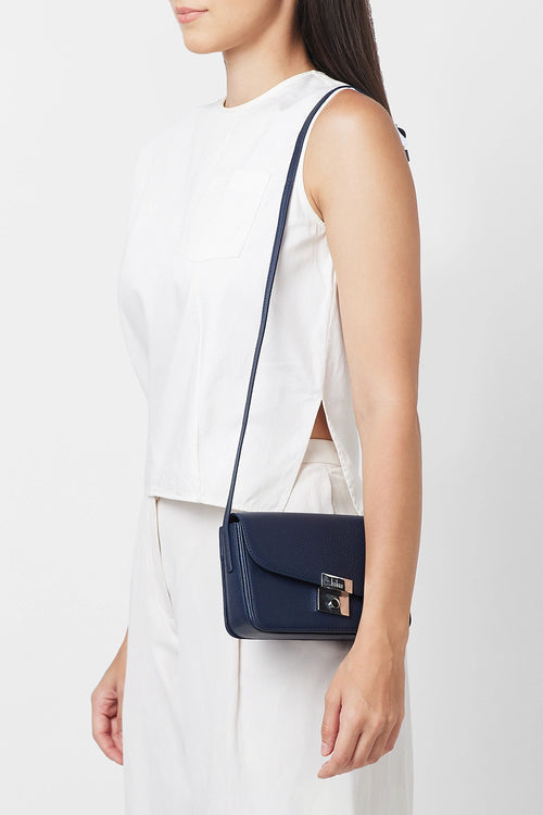 Simone Pebble Navy Mini Curve Crossbody Bag