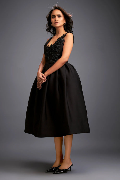 Elegant Black Top With  Voluminous Skirt