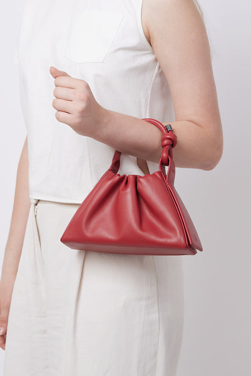 Tina Nappa Ruched Mulberry Mini Baguette Bag