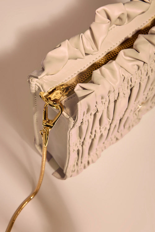 Crème Drift Sling Bag